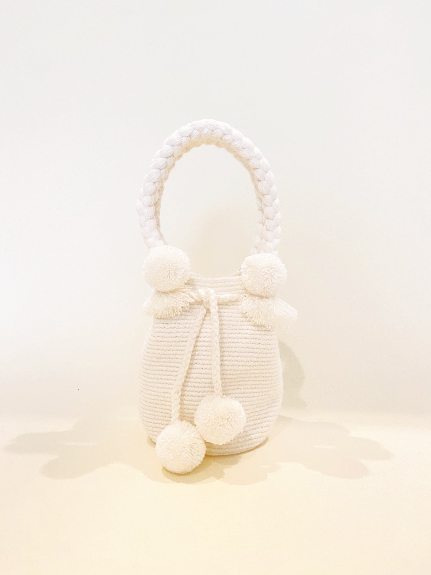 Ivory pompom bag