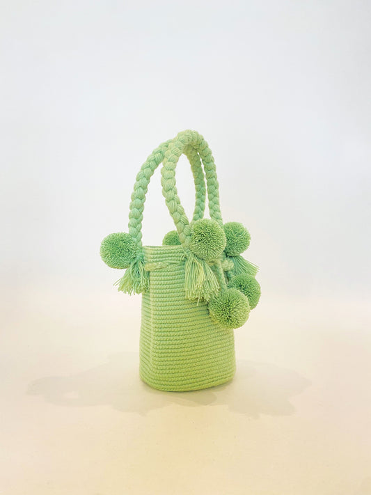 Pistachio Mini PomPom Bag detail - small pale green mini purse by Hola Guava