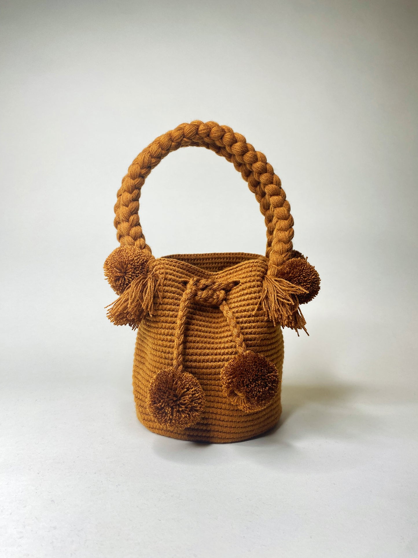 Brown mini pompom bag